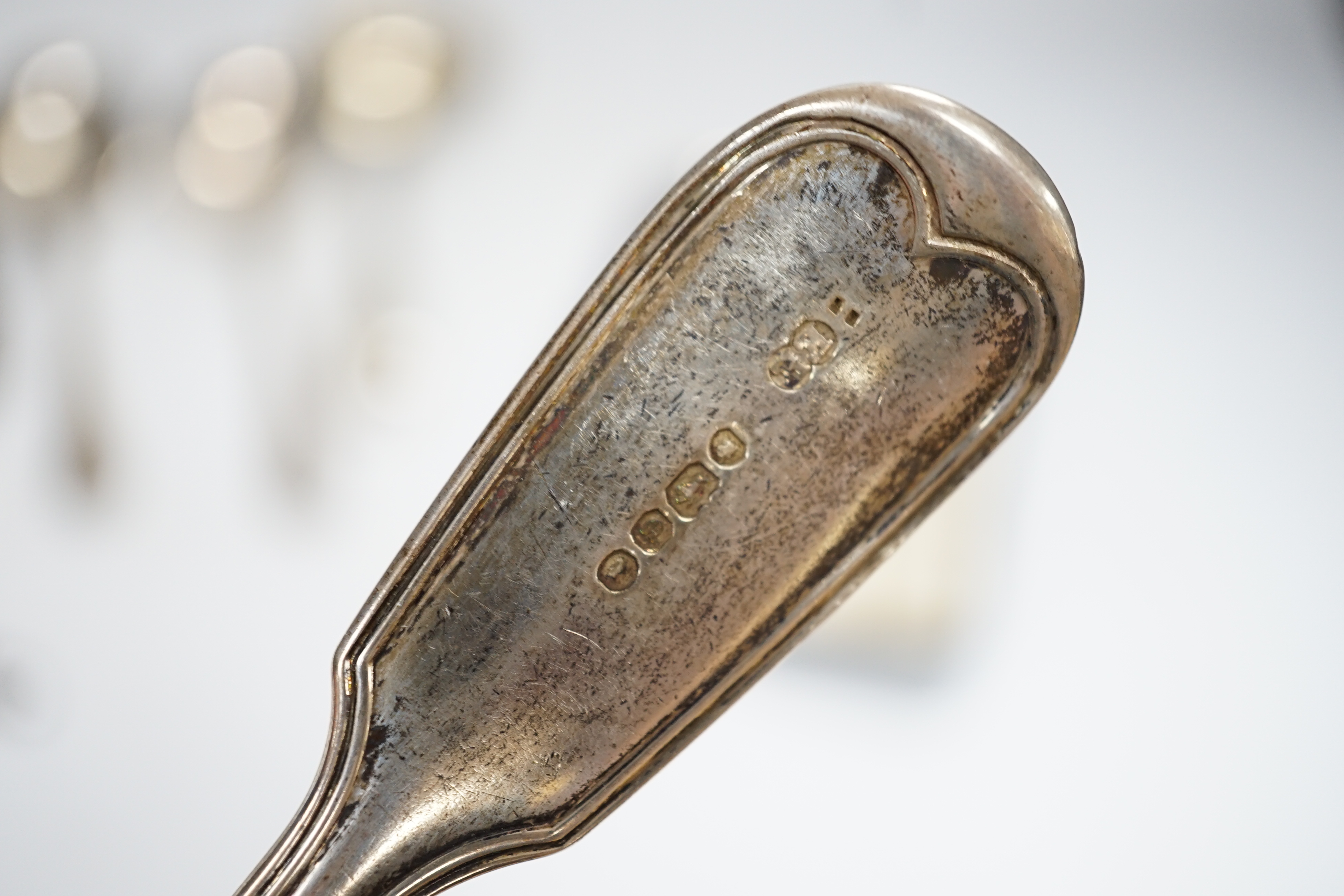 A small group of assorted silver flatware, including pair of fiddle and thread pattern sauce ladles, Elizabeth Eaton, London, 1848